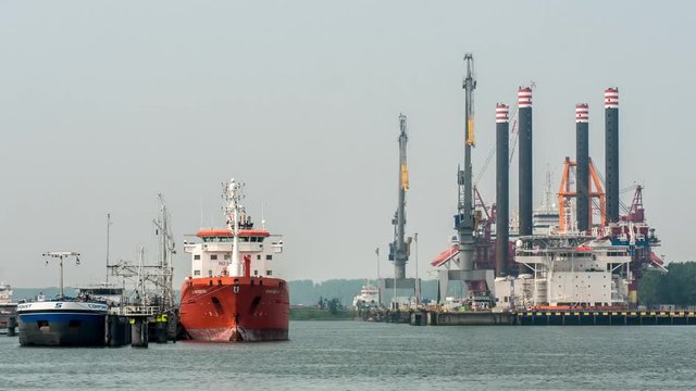 Timelapse port of Rotterdam with offshore repair yard in background