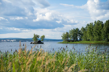 Small island in lake Tavatuy, Middle Ural, Sverdlovsk region, Russia