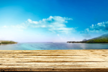 Naklejka na ściany i meble Table background of free space and summer landscapre of sea and sky 