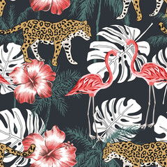 Obraz premium Pink flamingo, leopard, palm trees, red hibiscus flowers, black background. Vector seamless pattern. Tropical illustration. Exotic animals and birds. Summer beach design. Paradise nature
