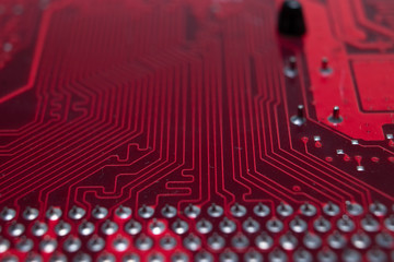 View from underside of a circuit board electronic. Computer hardware and things of Information...