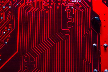 View from underside of a circuit board electronic. Computer hardware and things of Information...