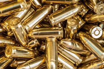 Naklejka premium Top detail macro view of large group of gun bullets