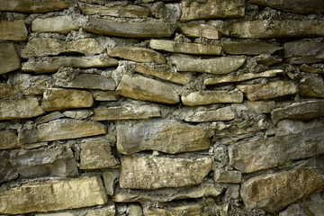 Horizontal layers of a rocky mountain. Natural background