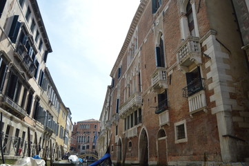 Fototapeta na wymiar Beautiful Venetian Style Palaces Seen Walking On Gondola In Venice. Travel, holidays, architecture. March 29, 2015. Venice, Veneto region, Italy.