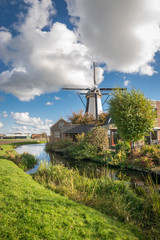 Traditional dutch windmill in the little town of Benthuizen, The Netherlands.