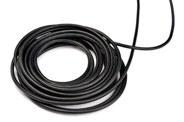 Black electric cable on white background.