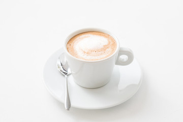 Coffee shop concept. Business startup. Cup of hot latte with milk foam on white background.