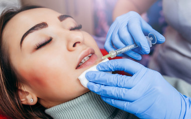 Injections of the lips. Correction form the upper lip. Injection of beauty. Spa. Facial...