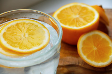 fresh water drink with ice and lemon slices 