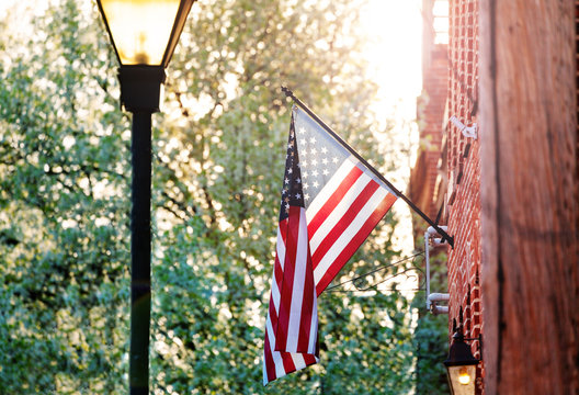 American flag on the red brick house in Baltimore