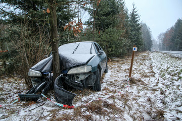 Car destroyed during the traffic accident. It was caused by the bad weather conditions in winter,...