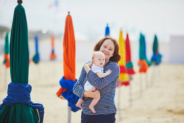 Mother and child on beach