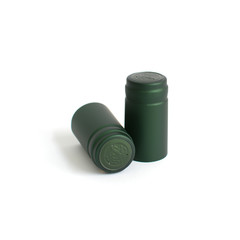 green caps for wine bottles on a white background 