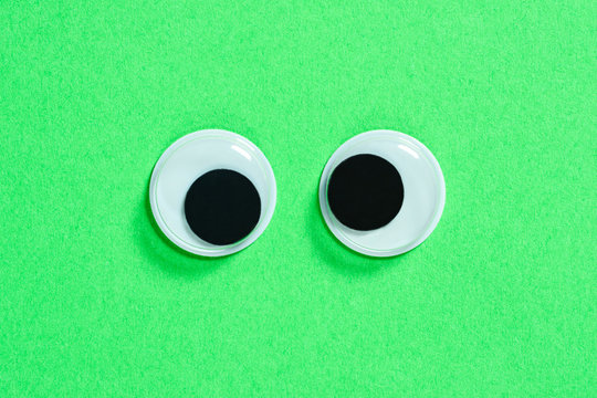 Premium Vector  Googly eyes plastic toys seamless pattern background funny  cartoon eye emotion texture in sketch