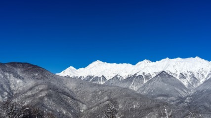 View of winter Caucasus Mountains, Krasnaya Polyana, Russia.