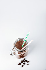 Sports nutrition with chocolate protein shake, top view. Copy space