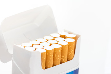 Open blue pack of cigarettes isolated on white