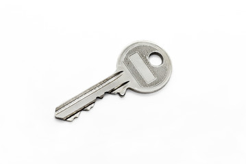 Silver classical key isolated on white background