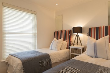Luxury bedroom with blankets and pillows