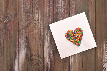 The envelope with a candy hearts. Concept Love.