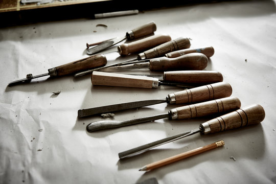 Close up of chisels on workbench