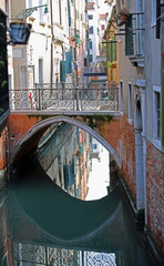 one of the many bridges of the island of Venice in Italy with th