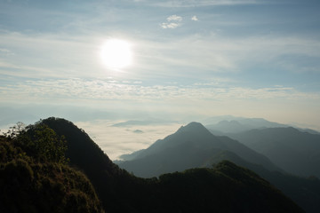 scenic mountain lined with alternates. The morning sun shines and fog covered the mountain. Doi KALHEPU, Mae Moei, Tak in Thailand