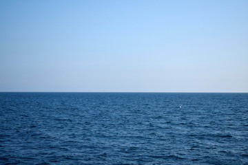 Sea, sky and skyline on a clear sunny day. Marine landscape