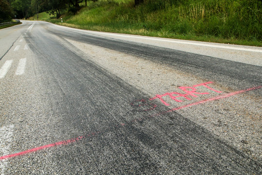 The rubber tracks from the racing cars left on the tarmac at the start of the hill climb stage. 