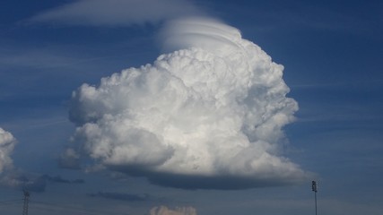 Swirled cloud in blue sky