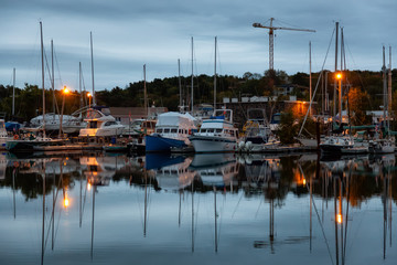 Armdale, Halifax, Nova Scotia, Canada - October 7, 2018: Armdale Yacht Club during a cloudy sunrise. - obrazy, fototapety, plakaty