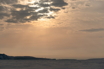 Fototapeta premium Winter sunset on a frozen river