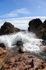 Rocky beach on the Pacific Ocean Coast during a sunny summer day. Taken in Palmerston Beach, Northern Vancouver Island, BC, Canada.