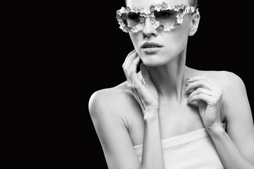 Fashion photo of beautiful model wearing floral sunglasses