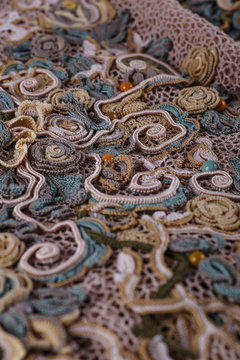 Crochet knitting. Lace of flowers.  Handmade Irish lace as a background
