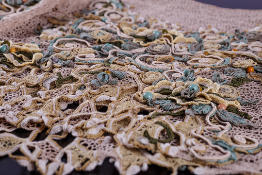 Crochet knitting. Lace of flowers.  Handmade Irish lace as a background