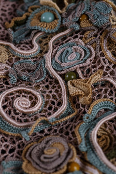 Crochet knitting. Lace of flowers.  Handmade Irish lace as a background