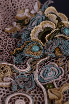 Crochet knitting. Lace of flowers.  Handmade Irish lace as a background