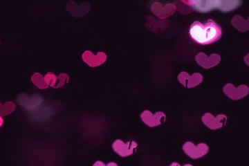 Purple Hearts. St. Valentine's Day. Dark background. Romantic