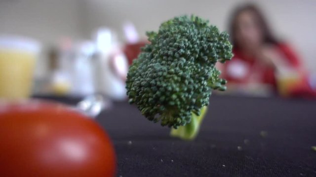 Closeup Vegetables Cherry Tomato Broccoli And Carrots Falling On Dirty Table