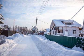 Cottage village covered with snow