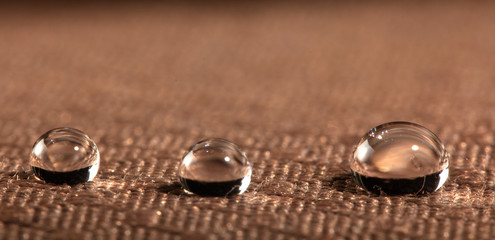 Obraz na płótnie Canvas Water droplets on moisture resistant fabric Close up