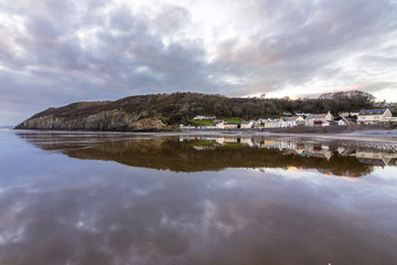Amazing colorful reflections at Pendine beach, famous because of car speed world records in its...