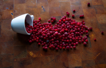 Lingonberries on cutting board