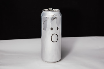 Concept of beaten man with plaster strip. Astonished emoticon on aluminium can, Emoji with...