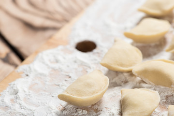 Raw dumplings ready to boil, close up, with copy space. Also known as Vareniks. Ukrainian...