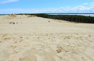 June 24, 2018: Tourist on sand dunes in Leba, Slowinski National Park, Poland