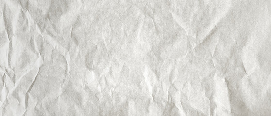 Thin, light paper with wrinkles on the surface