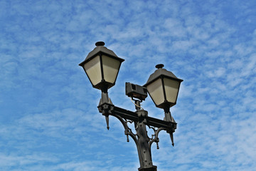 Fototapeta na wymiar street lamp on blue sky background